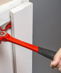 Person using 18 Oz Steel Indexing Claw Hammer With Cushion Grip Handle For Nail Driving Magnetic Nail Starter And Four Position Leverage