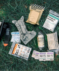 IFAK Trauma Kit With CAT Tourniquet And Israeli Bandage Wound Care Essentials In MOLLE Pouch, field components displayed