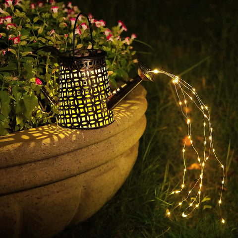 Solar Watering Can Garden Decor With Outdoor Lights Waterproof Hanging Lantern featuring 50 LED copper coin pattern on planter.