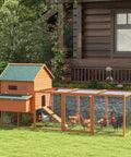Big Ol Backyard Chicken Coop For Eight To Ten Hens With Nesting Boxes And Run In Bright Orange next to a house and garden