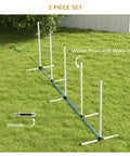 Two Piece Dog Agility Training Equipment Set With Water Spray Tube And Weave Poles, grassy yard setup.