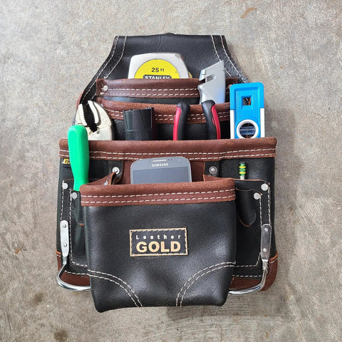 Oil Tanned Leather Tool Pouch For Carpenters With 10 Pockets And 2 Hammer Holders Heavy Duty Construction Pouch With Reinforced Seams Pro Grade Framing And Contractor Tool Bag filled with tools