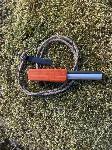 Compact European Fire Steel Ferro Rod With Magnesium On A Durable Lanyard Trail Ready Go To Emergency Fire Starter on moss