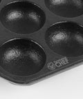 Close-up of Seven Section Cast Iron Danish Aebleskiver Pan For Mini Puffs And Pancake Balls Preseasoned Heats Evenly