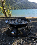 Portable Propane Fire Pit 21 Inch Smokeless Gas Firebowl With 58,000 BTU No Mess Campfire by a lakeside