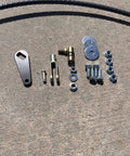 Components of Transfer Case Cable Shifter Kit For 231 Fits Wrangler TJ LJ 1997 2006 laid out on concrete surface