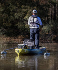 Person using Dual Outriggers Standncast Gen II For Small Boats And Canoes With 30 Inch Adjustable Arms And Railblaza StarPort HD Mount