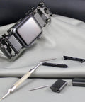 Watch Adapter For TREAD And TREAD LT Black Easy Swap Kit with adapters, pin tool, Apple pins, and TREAD bracelet on display.