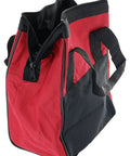 Bombproof Canvas Power Tool Bag Carrier For Drill Drivers Batteries Chargers Jobsite Gear Hauler showing red and black color with zipper and handles.