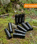 Beefy Aluminum Bike Seatpost Reducer Shim, 100mm Length, displayed in multiple black tubes on grassy terrain