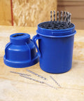 Jobber Length Drill Bit Pod Organizer With 29 Slots For 1/16 To 1/2 Inch Bits, blue organizer with twist lock lid, open on workbench