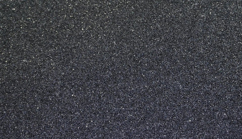 Close-up of 60 grit 32 mil thick Black Non Slip Tape 3 inch wide by 60 feet long Anti Slip Traction Tape for indoor and outdoor use