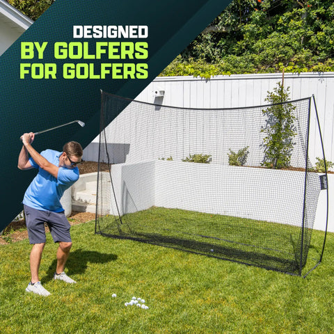 Man using Limited Edition Black Golf Practice Net With Large 10 Ft By 7 Ft Hitting Space Pro Grade Personal Driving Range