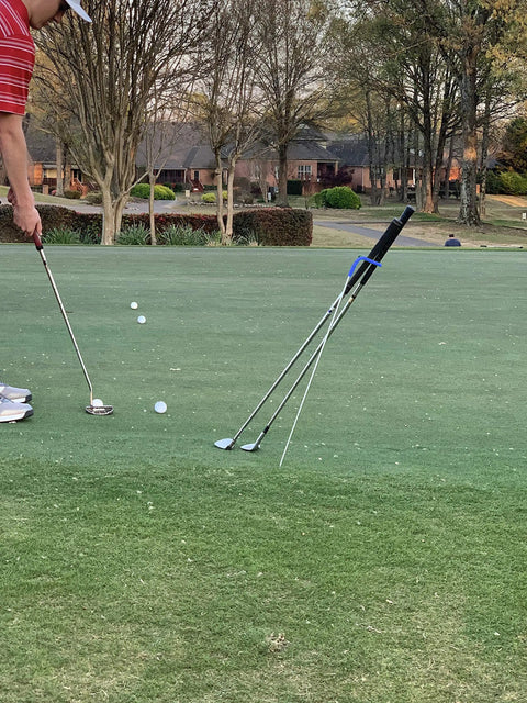 V Shaped Golf Club Stand For On Course Gear Keeps Clubs Clean, Dry And Visible, Durable Stainless Steel Construction in use on green