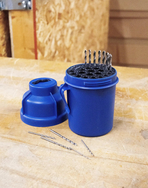 Jobber Length Drill Bit Pod Organizer With 29 Slots For 1/16 To 1/2 Inch Bits, twist lock lid, shown open on a workbench.