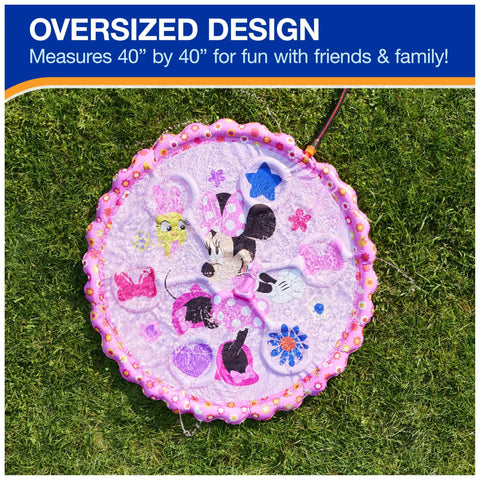 Minnie Mouse Splash Pad For Kids With Built In Sprinklers, The Sickest Outdoor Water Toy For Summer Fun, Disney Pool Party Essential For Ages 1 And Up, Pink Floral Pattern, Quick Setup For Nonstop Splash showing pink floral splash pad with character designs on grass.
