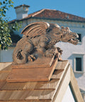 Winged Dragon Roof Cresting Sculpture In Terra Cotta on rooftop, hand cast stone resin ornament for roofline, adds old world panache