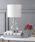 Clear Glass Table Lamp 20.5 Inches With White Linen Shade Sleek Modern Gourd Design on bedside table with books