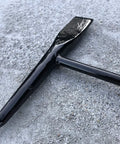 Tough As Nails Welding Chipping Hammer With Comfort Grip Spiral Handle And Anti Rust Tempered Steel Head close-up on surface.