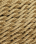 Close-up of the soft polyester rope texture of an Outdoor Hammock Chair Swing For Reading And Lounging On The Patio Or Indoors 300 lb Capacity Caribbean XL Tan.