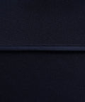 Close-up of navy waterproof fabric for Outdoor Table Cover With Umbrella Hole And Zipper 60x84 Inch Navy Low Maintenance Washable Waterproof Spill Proof Wrinkle Free Tablecloth For Patio Porch Spring Summer Bbqs Picnics