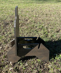 Side view of Beefy Three Eighths Inch Hardened Steel Shooting Target 7x12 IDPA Size With Metal Ground Stand on grass