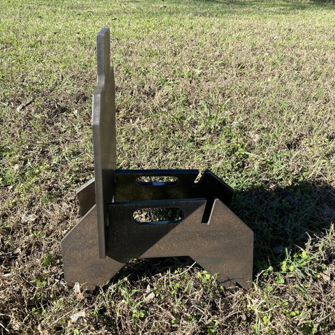 Side view of Beefy Three Eighths Inch Hardened Steel Shooting Target 7x12 IDPA Size With Metal Ground Stand on grass