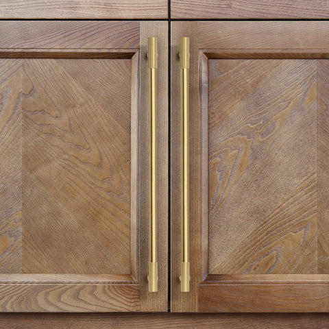 Top Tier Solid Brass Cabinet Pulls With Brushed Gold Finish on wooden cabinet doors, showcasing modern sleek design and 320mm spacing.