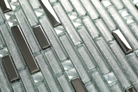 Close-up of sparkling silver crystal glass tile mosaic with metallic shine for kitchen backsplash, bathroom, and shower walls.