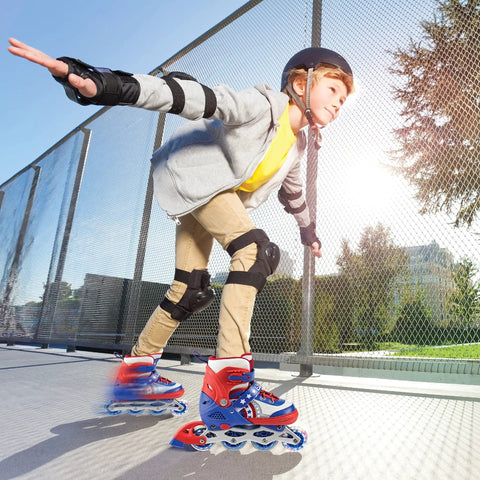 Child skating on pavement wearing LED Light Up Inline Skates For Kids With Three Adjustable Sizes, helmet, knee pads, and elbow pads.