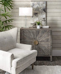 Toledo 25 Inch Crystal Table Lamp With Cotton Shade on modern wooden end table in a cozy living room.