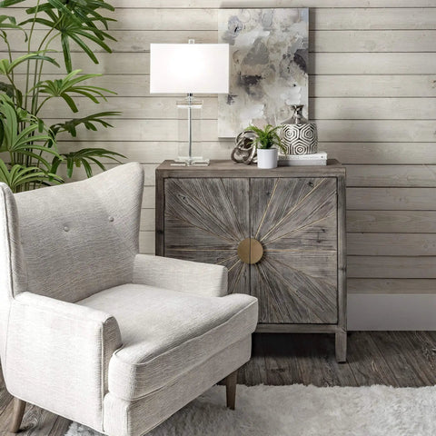 Toledo 25 Inch Crystal Table Lamp With Cotton Shade on modern wooden end table in a cozy living room.