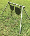 AR500 Steel Target Stand Brackets Mounts For One Inch Pipe Or Three Quarter Inch EMT Conduit Two Pack in grassy field