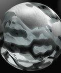Abstract sphere resembling a stylized camouflage pattern, related to Rotary XL Performance Upgrade Kit For Cars With High Flow Turbo Components.