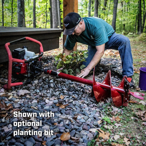 One Or Two Person Use 52Cc Auger Beast Powerhead with a planting bit in use by a worker on rocky soil site.