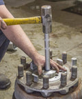 Using Heavy Duty Truck Bearing Race And Seal Driver Set With Six Drivers And Handle Extension on truck hub without drum removal