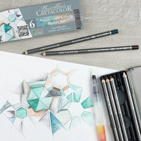 Water-Soluble Graphite Pencils Set With Aquarelle Finish, Six HB Pencils In White, Brown, Teal, Green, Red, And Blue For Dope Washable Sketching And Watercolor Effects shown with geometric sketch and packaging.
