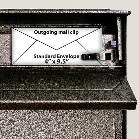 Interior view of Townhouse Bronze Wall Mount Locking Mailbox with outgoing mail clip holding a 4" x 9.5" envelope.