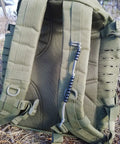 Backpack with Pace Count Beads For Land Navigation Kit attached, rugged nylon cord, black on hiking trail