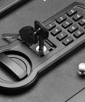 Close-up of Slim Desk Drawer Safe With Programmable Electronic Keypad For Quick Access, showing keypad and keys on black safe surface.