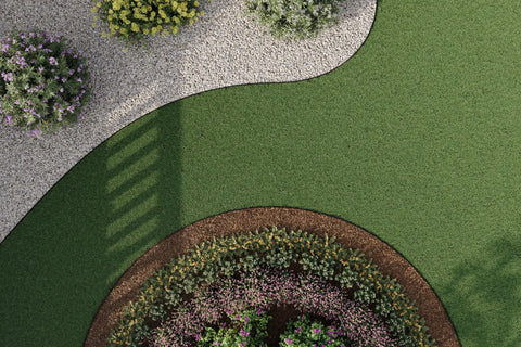 Aerial view of landscape with curved garden borders defined by 4 Inch Composite Landscape Edging Kit With 40 Foot Roll And 24 Anchoring Stakes.
