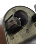 Automotive vacuum pump, black plastic housing, round intake port with two pins, top view
