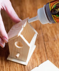 Applying Heavy Duty Waterproof Polyurethane Glue For All Materials That Expands To Create A Bond Like Crazy 18 Ounce Brown Bottle to wood