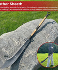Beefy 53 Inch Chinese Podao Halberd Polearm with hand forged high carbon steel blade and leather sheath on a rock.
