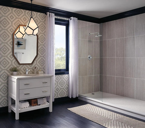 Modern bathroom with chrome fixtures, white vanity, geometric wallpaper, and glass shower; Modern One Handle Project Pack Chrome Faucet With Rigid Spout WaterSense Labeled ADA Compliant Fits Single Hole Installations Durable Metal Build Easy Install Low Flow Design For Big Water Savings.