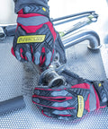 Impact 360 Cut A6 Work Gloves With Touchscreen Conductive Palms And Fingers ANSI A6 Cut Protection in use on metal pipe