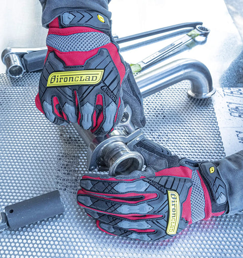 Command Impact 360 Cut A6 Work Gloves With Touchscreen Conductive Palms and Fingers in red, used in metalworking task.