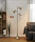 Caprice LED Floor Lamp In Antique Satin Brass With Three 360 Degree View LED Bulbs in living room setting