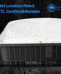 Close-up of Super Bright 50W LED Canopy Light 6000 Lumens 100 to 277V AC ETL Listed IP65 Waterproof Daylight White with rain on surface.