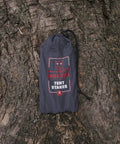 Beefy 16 Pack 7075 Aluminum Tent Stakes 7.25 Inch Long Heavy Duty Ground Pegs in carry bag on tree trunk